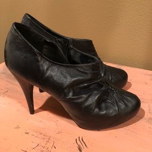 Women’s black bootie heals